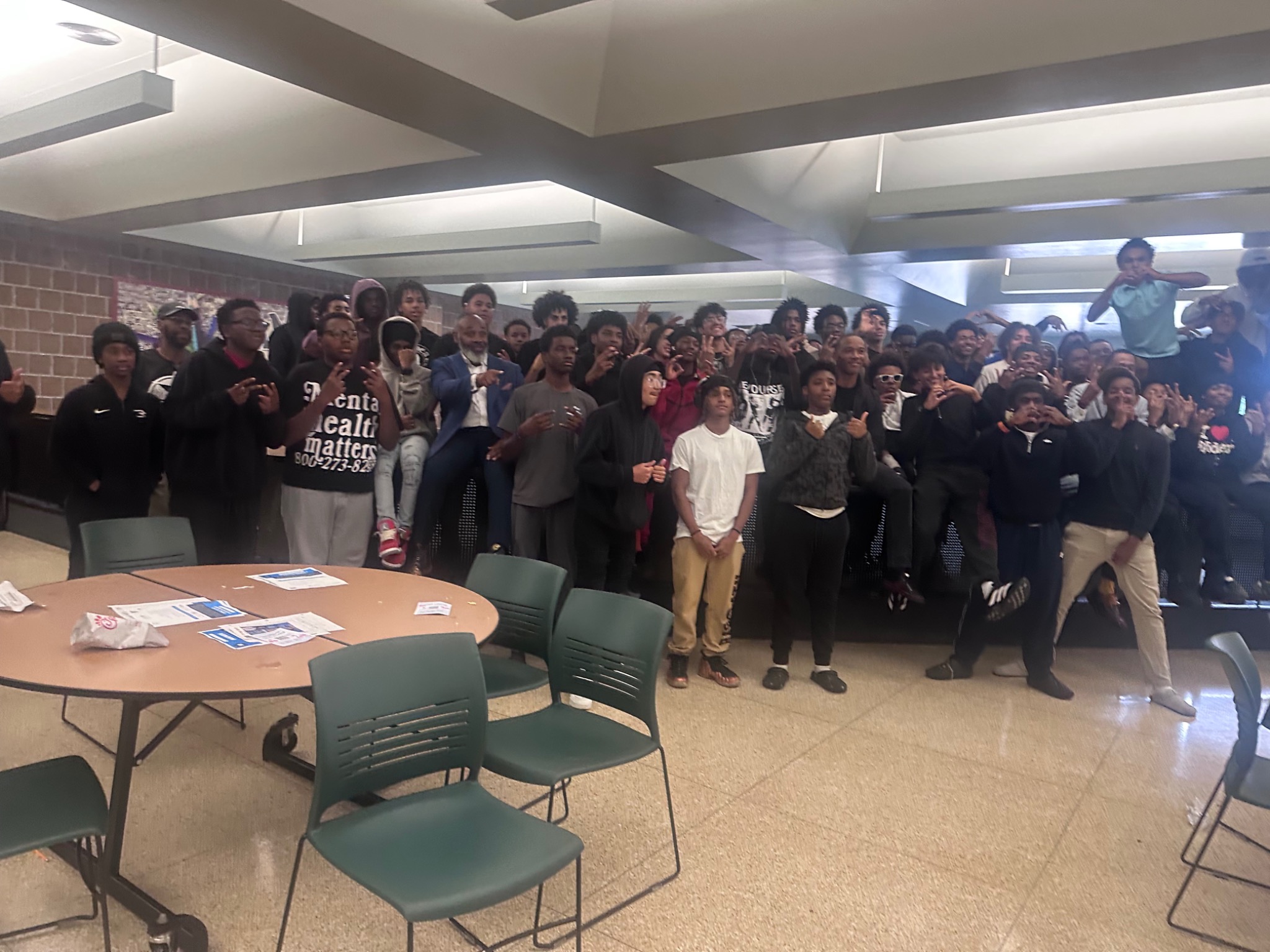 Dr. Jones with students following a youth leadership engagement